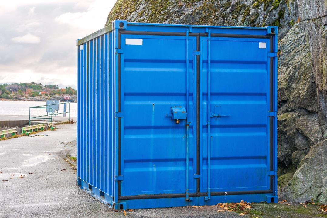 One Blue Cargo Container at Coast in Sweden