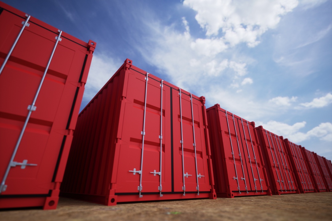 Red cargo containers in the row