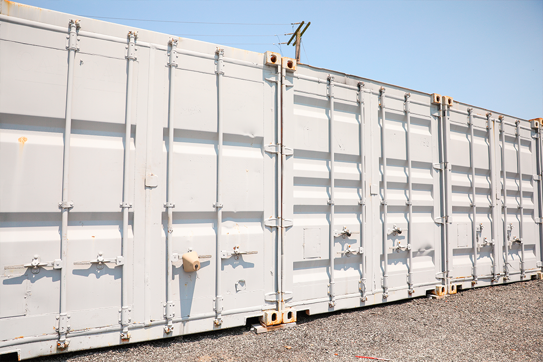 white storage containers at yard